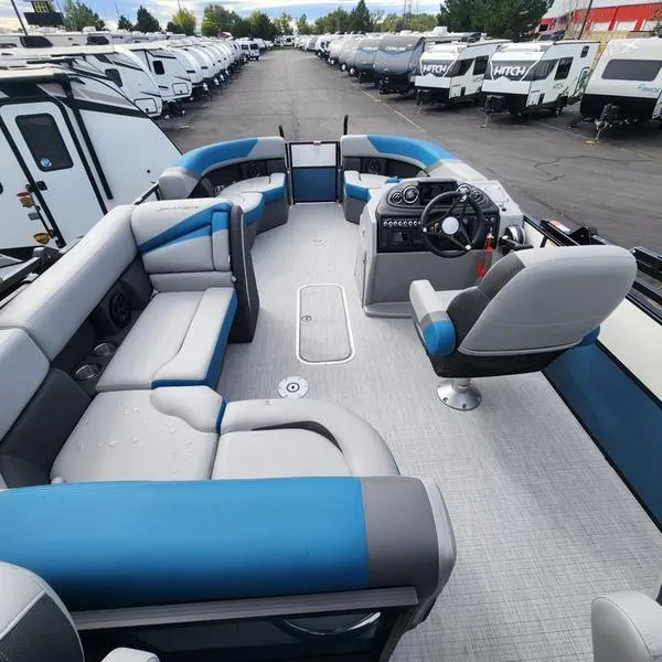 Slide: The Image of 2024 South Bay S224FCR 3.0 pontoon boat interior with blue and gray seating. - 11
