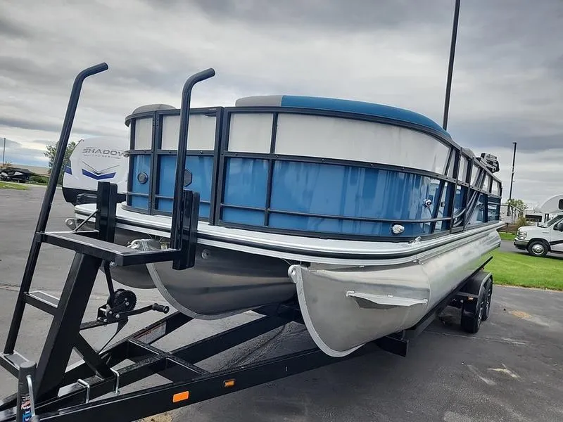 Slide: The Image of 2024 South Bay S224FCR 3.0 pontoon boat on trailer, overcast sky. - 7