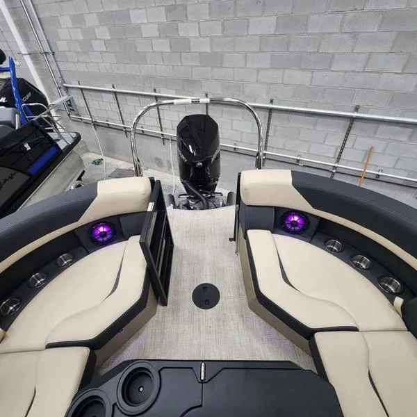 Slide: The Image of 2024 South Bay S224RS 3.0 pontoon boat interior with plush seating and modern design. - 11