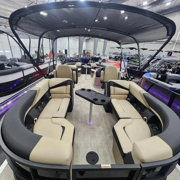 Slide: The Image of 2024 South Bay S224RS 3.0 pontoon boat interior with spacious seating and canopy. - 13