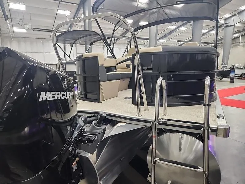 Slide: The Image of 2024 South Bay S224RS 3.0 pontoon boat with Mercury engine in showroom. - 20