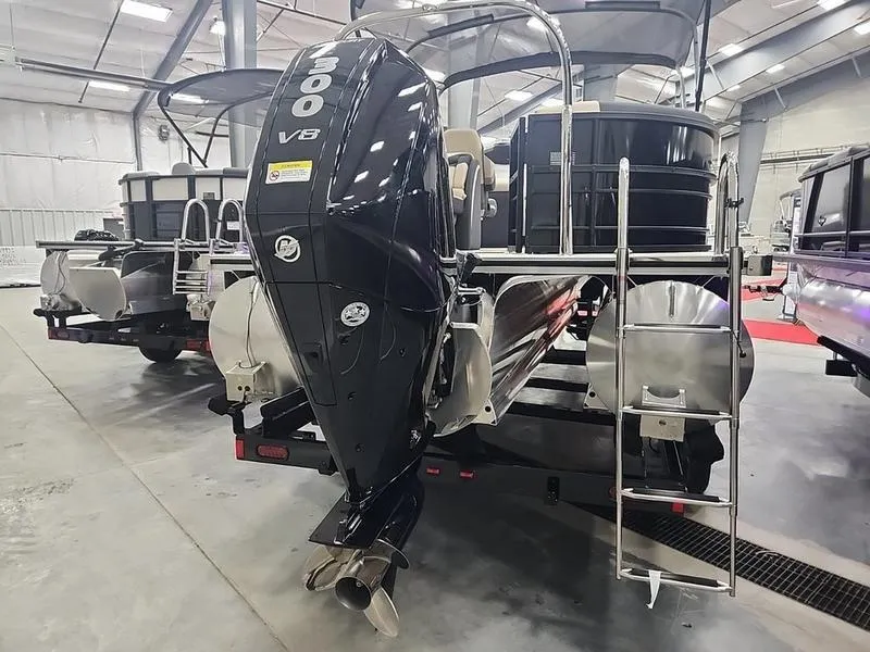 Slide: The Image of 2024 South Bay S224RS 3.0 pontoon boat with powerful 300 V8 engine in showroom. - 22