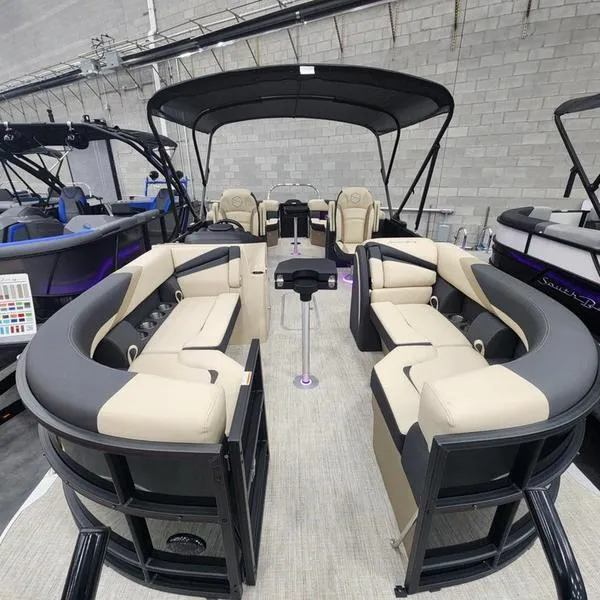 Slide: The Image of 2024 South Bay S224RS 3.0 pontoon boat with spacious seating and canopy. - 5