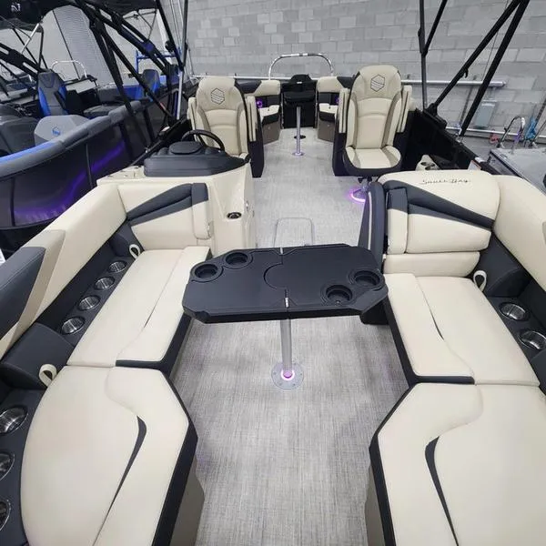 Slide: The Image of Luxurious 2024 South Bay S224RS 3.0 pontoon boat interior with plush seating and modern design. - 7