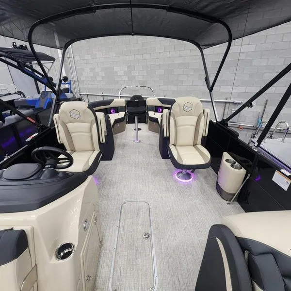 Slide: The Image of 2024 South Bay S224RS 3.0 pontoon boat interior with plush seating and modern design. - 8