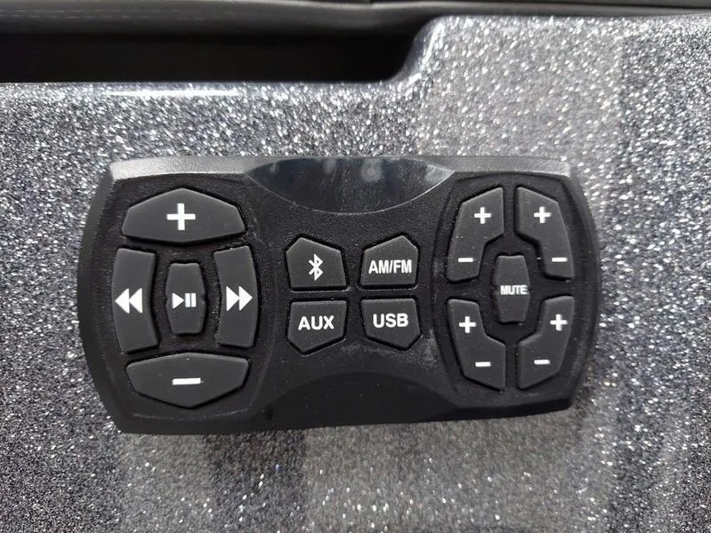 Slide: The Image of Control panel of 2023 MasterCraft XT23 boat with audio and Bluetooth options. - 11