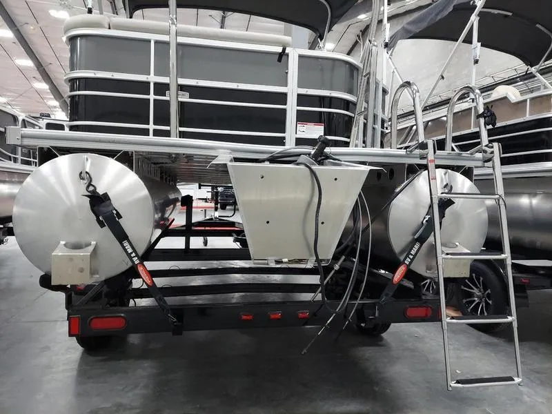 Slide: The Image of 2023 South Bay 220CR LE 25" pontoon boat rear view in showroom. - 6