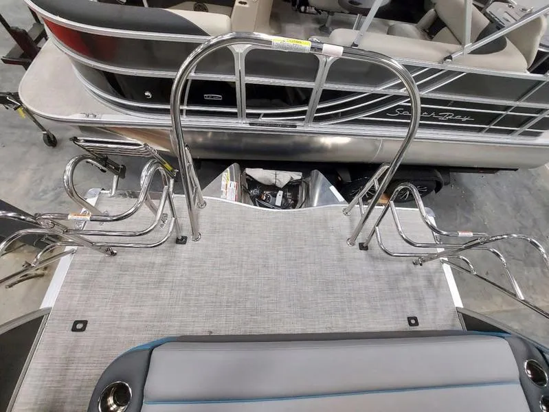 Slide: The Image of 2023 South Bay S224 UL 3.0 pontoon boat with stainless steel railings and seating. - 15