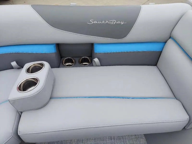 Slide: The Image of 2023 South Bay S224 UL 3.0 boat seating with cup holders and stylish upholstery. - 24