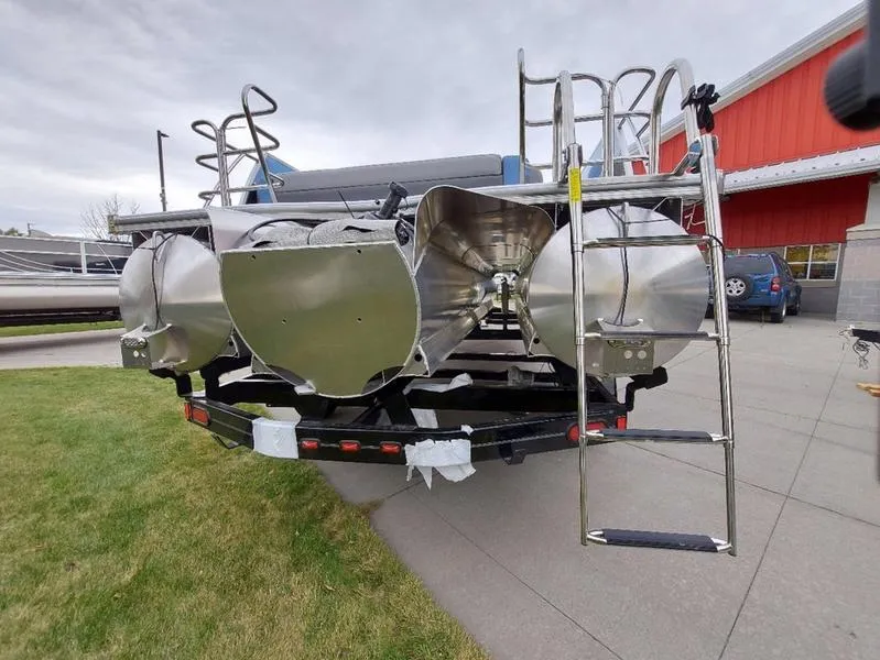 Slide: The Image of 2023 South Bay S224 UL 3.0 pontoon boat on trailer, rear view with ladder. - 31