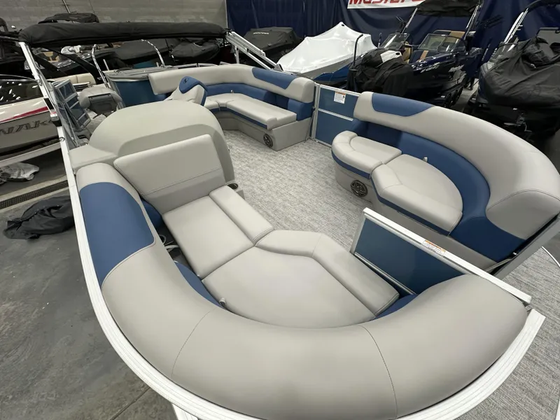 Slide: The Image of 2025 South Bay 222FCRLE pontoon boat interior with plush seating and modern design. - 9