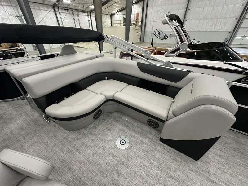 Slide: The Image of Luxurious seating in 2025 South Bay 224FCRLE pontoon boat, featuring sleek design and comfortable upholstery. - 9