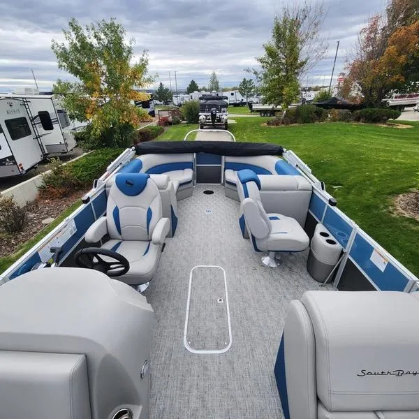 Slide: The Image of 2024 South Bay 222RS LE 2.75 pontoon boat with spacious seating and modern design. - 12