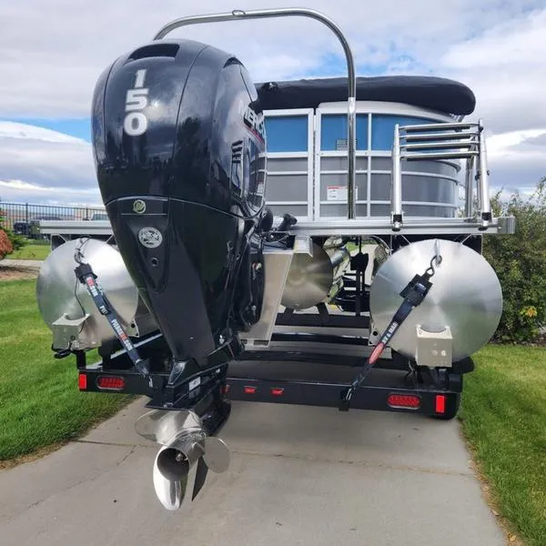 Slide: The Image of 2024 South Bay 222RS LE 2.75 pontoon boat with powerful outboard motor. - 4