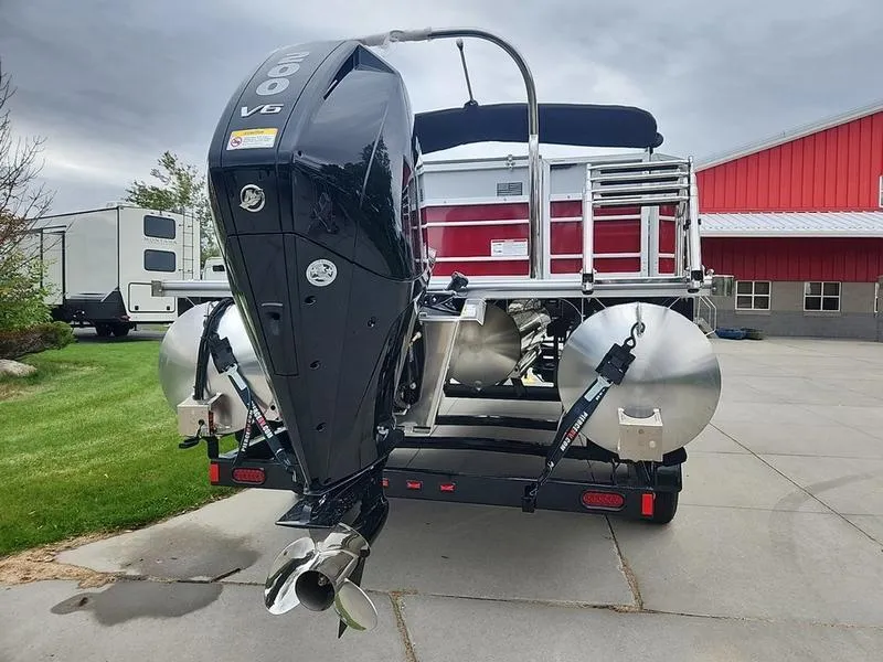 Slide: The Image of 2024 South Bay S224FCR 2.75 pontoon boat with powerful V6 engine, parked outdoors. - 4