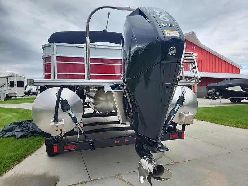 Slide: The Image of 2024 South Bay S224FCR 2.75 pontoon boat with powerful outboard motor. - 5