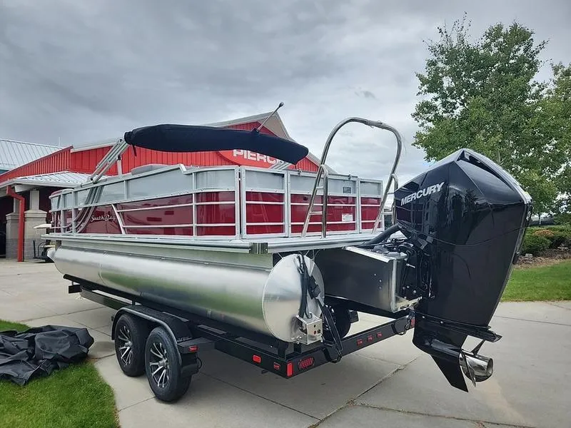 Slide: The Image of 2024 South Bay S224FCR 2.75 pontoon boat with Mercury engine on trailer. - 6