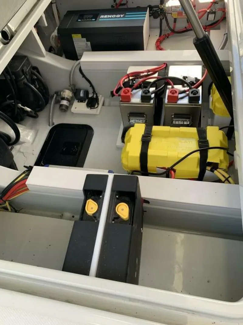 Slide: The Image of 2023 Saxdor 320 GTO engine compartment with batteries and electrical components. - 22