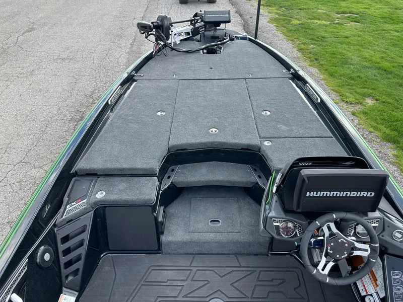 Slide: The Image of 2024 Skeeter FXR21 LE fishing boat interior with Humminbird electronics and spacious deck. - 12