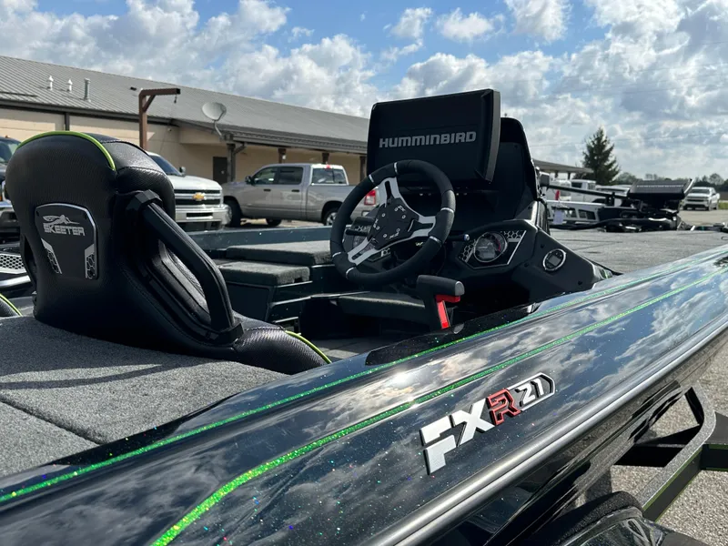 Slide: The Image of 2024 Skeeter FXR21 LE boat with Humminbird electronics, sleek design, and modern features. - 14