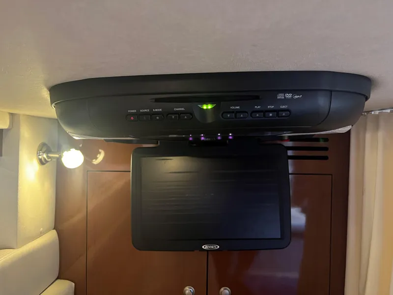 Slide: The Image of Ceiling-mounted entertainment system in 2008 Sea Ray 340 Sundancer cabin. - 25