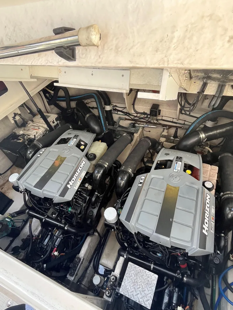 Slide: The Image of 2008 Sea Ray 340 Sundancer engine compartment with twin Horizon engines. - 29