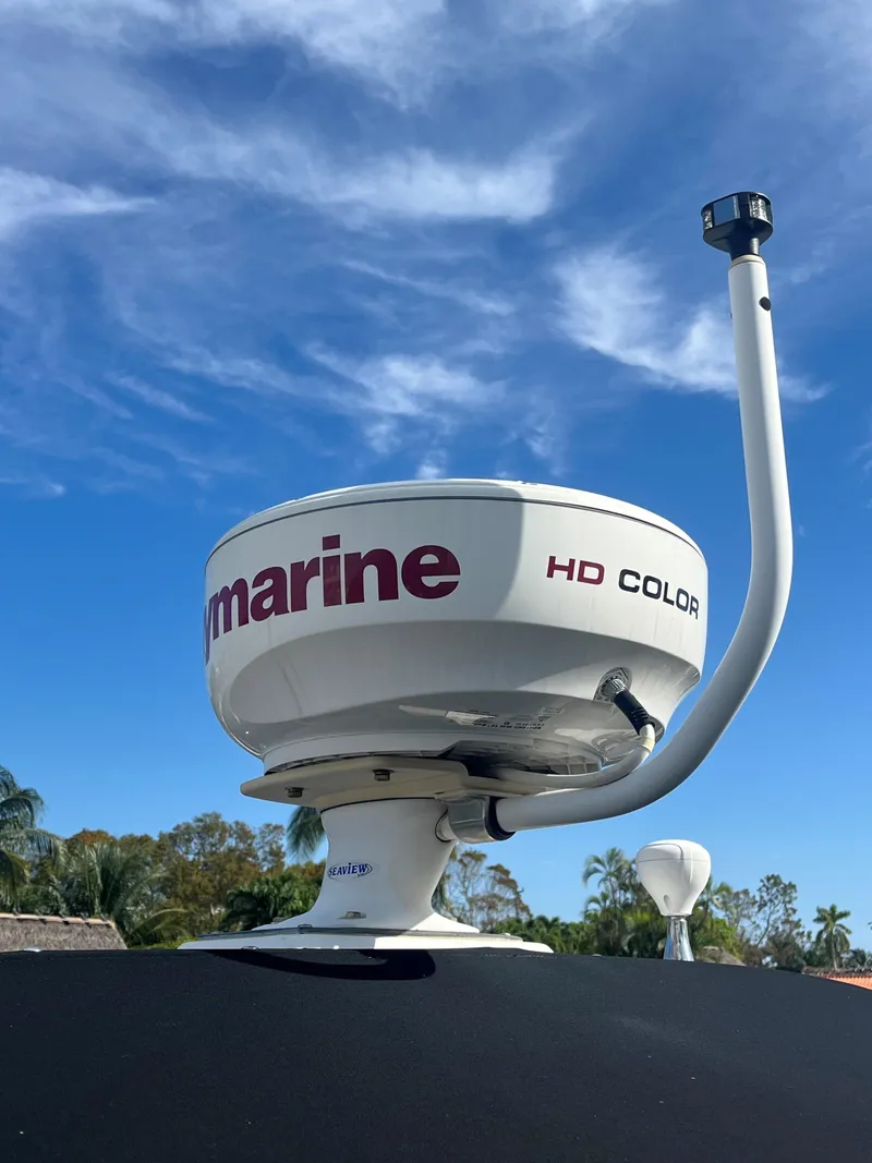 Slide: The Image of Radar equipment on a 2008 Sea Ray 340 Sundancer against a clear blue sky. - 8