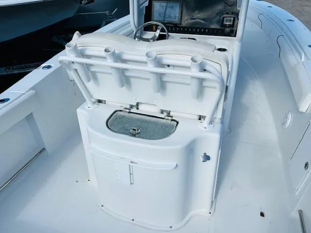 Slide: The Image of 2019 Sea Hunt Gamefish 27 boat with twin 200 engines, featuring a coffin box. - 5