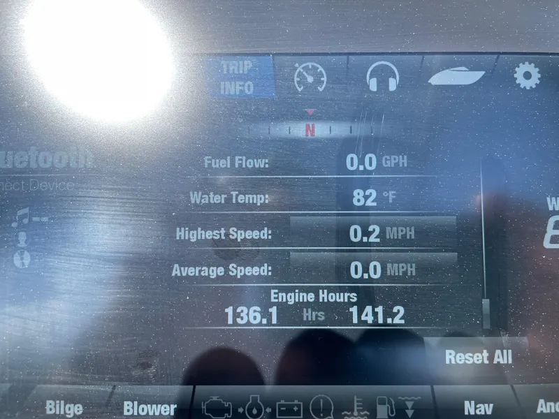 Slide: The Image of Yamaha Boats 2018 242X E-Series dashboard display showing trip info and engine hours. - 11