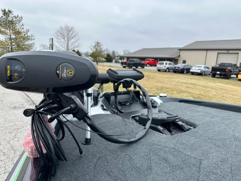 Slide: The Image of 2024 Skeeter ZXR19 boat with advanced trolling motor in a parking lot. - 16