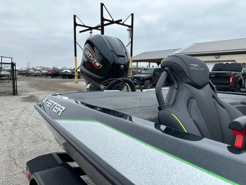 Slide: The Image of 2024 Skeeter ZXR19 boat with Yamaha engine, parked outdoors. - 19