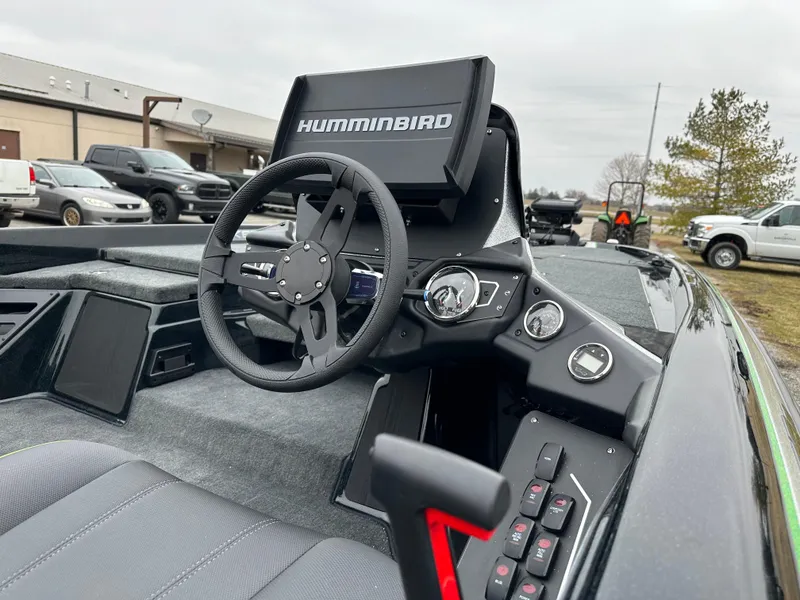 Slide: The Image of 2024 Skeeter ZXR19 boat cockpit with Humminbird electronics and steering wheel. - 20
