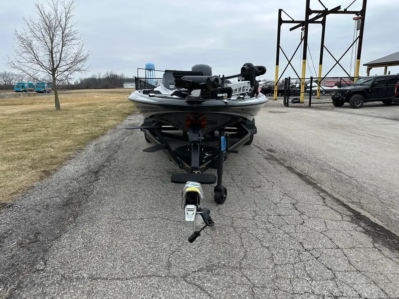 Slide: The Image of 2024 Skeeter ZXR19 boat on trailer in parking lot. - 3