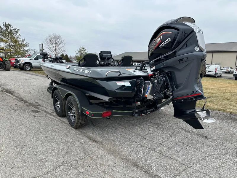 Slide: The Image of 2024 Skeeter ZXR19 boat with powerful outboard motor on a trailer. - 9