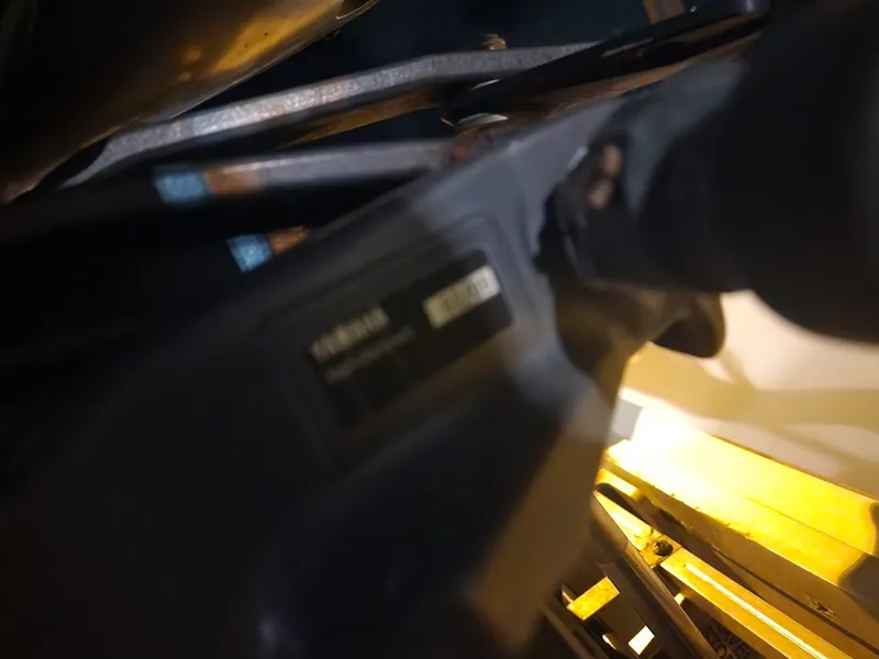 Slide: The Image of Close-up of a 2005 Sea Hunt Navigator 22 engine component. - 23