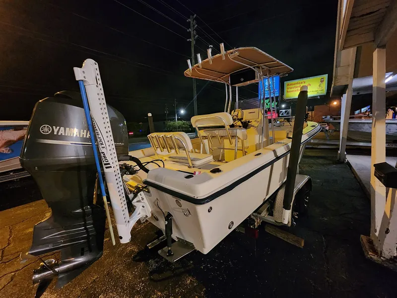 Slide: The Image of 2005 Sea Hunt Navigator 22 boat with Yamaha engine, parked at night. - 25