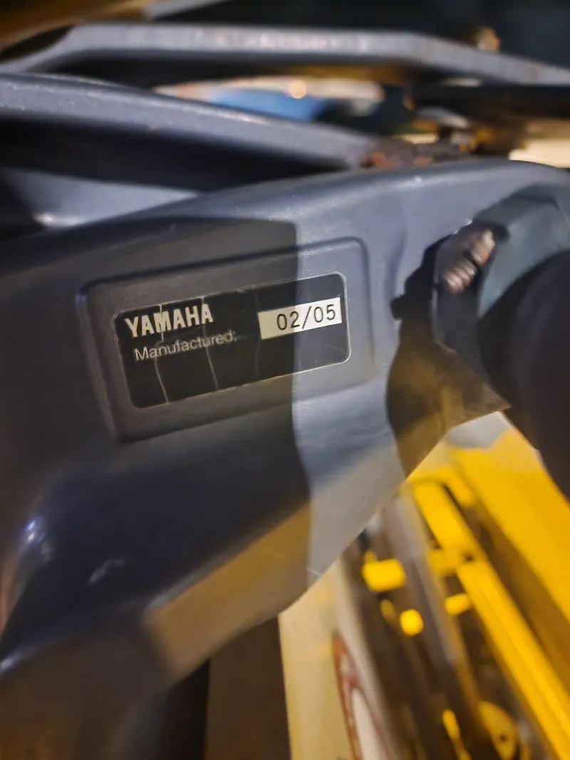 Slide: The Image of Yamaha engine part with manufacturing date label, February 2005, on Sea Hunt Navigator 22. - 29