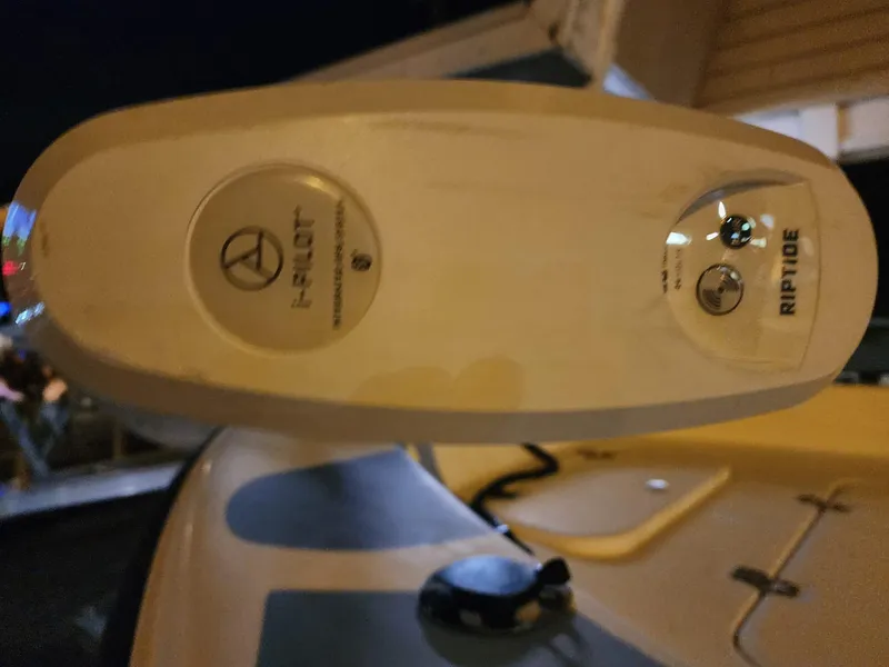 Slide: The Image of Close-up of a 2005 Sea Hunt Navigator 22 boat's Riptide motor control panel. - 9