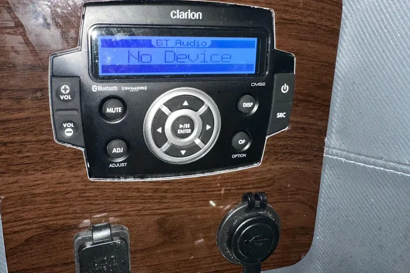 Slide: The Image of Clarion audio system in 2022 Chaparral 267 SSX OB boat, displaying "No Device." - 13