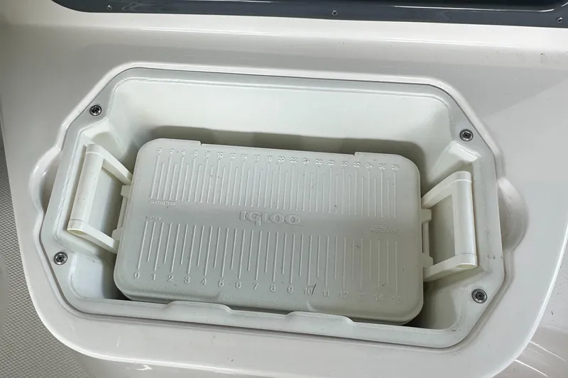 Slide: The Image of Built-in cooler on 2022 Chaparral 267 SSX OB boat. - 23