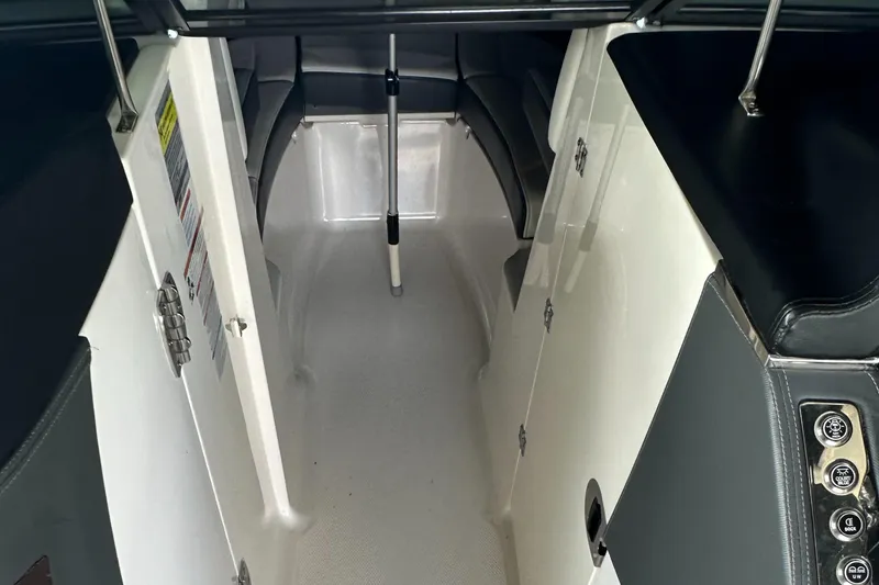 Slide: The Image of 2022 Chaparral 267 SSX OB boat interior with sleek seating and modern design. - 34