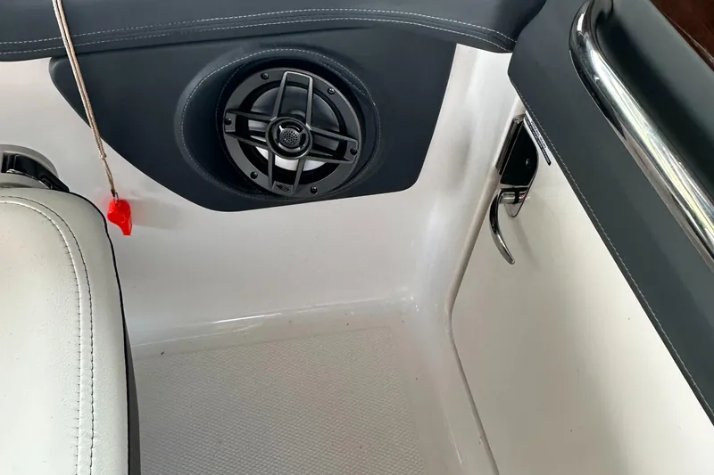 Slide: The Image of Interior of 2022 Chaparral 267 SSX OB boat with speaker and seating. - 39