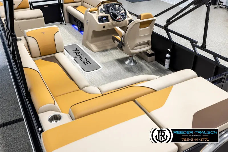 Slide: The Image of Luxurious interior of 2025 Tahoe SP Cr boat with tan seating and modern helm. - 11