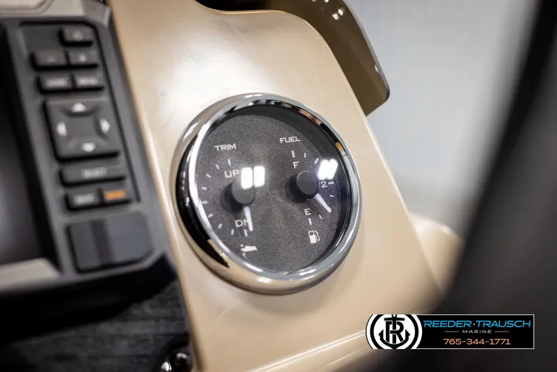 Slide: The Image of Close-up of 2025 Tahoe SP Cr dashboard with trim and fuel gauges. - 30