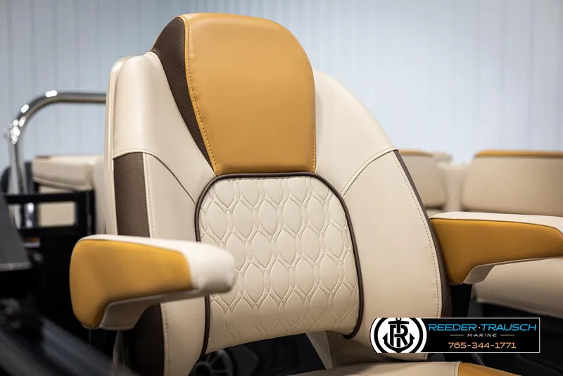 Slide: The Image of Luxurious 2025 Tahoe SP Cr boat seat with elegant beige and brown design. - 32