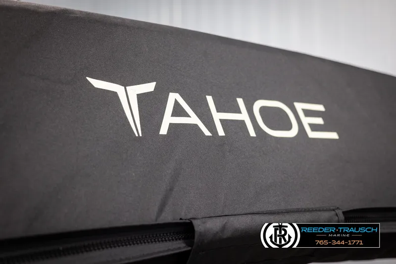Slide: The Image of 2025 Tahoe SP Cr logo on black surface, featuring Reeder-Trausch Marine branding. - 38