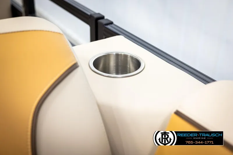 Slide: The Image of 2025 Tahoe SP Cr boat seat with cup holder, featuring beige and yellow upholstery. - 39