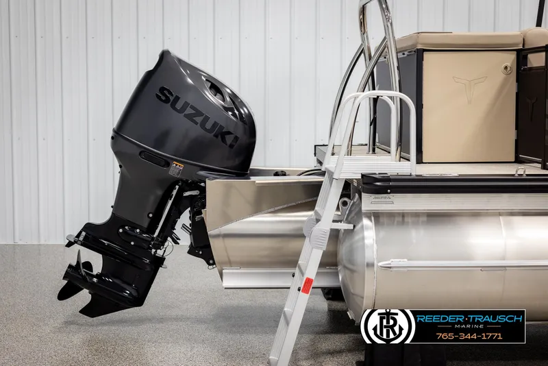 Slide: The Image of 2025 Tahoe SP Cr pontoon boat with Suzuki outboard motor and ladder. - 42
