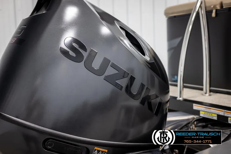 Slide: The Image of Suzuki outboard motor on a 2025 Tahoe SP Cr boat at Reeder-Trausch Marine. - 43