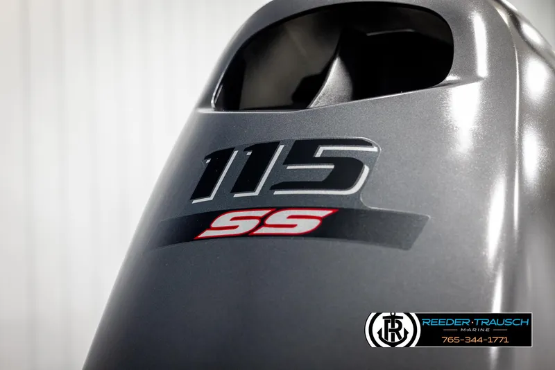 Slide: The Image of Silver Tahoe SP Cr 2025 outboard motor with "115 SS" branding, Reeder-Trausch Marine logo. - 44